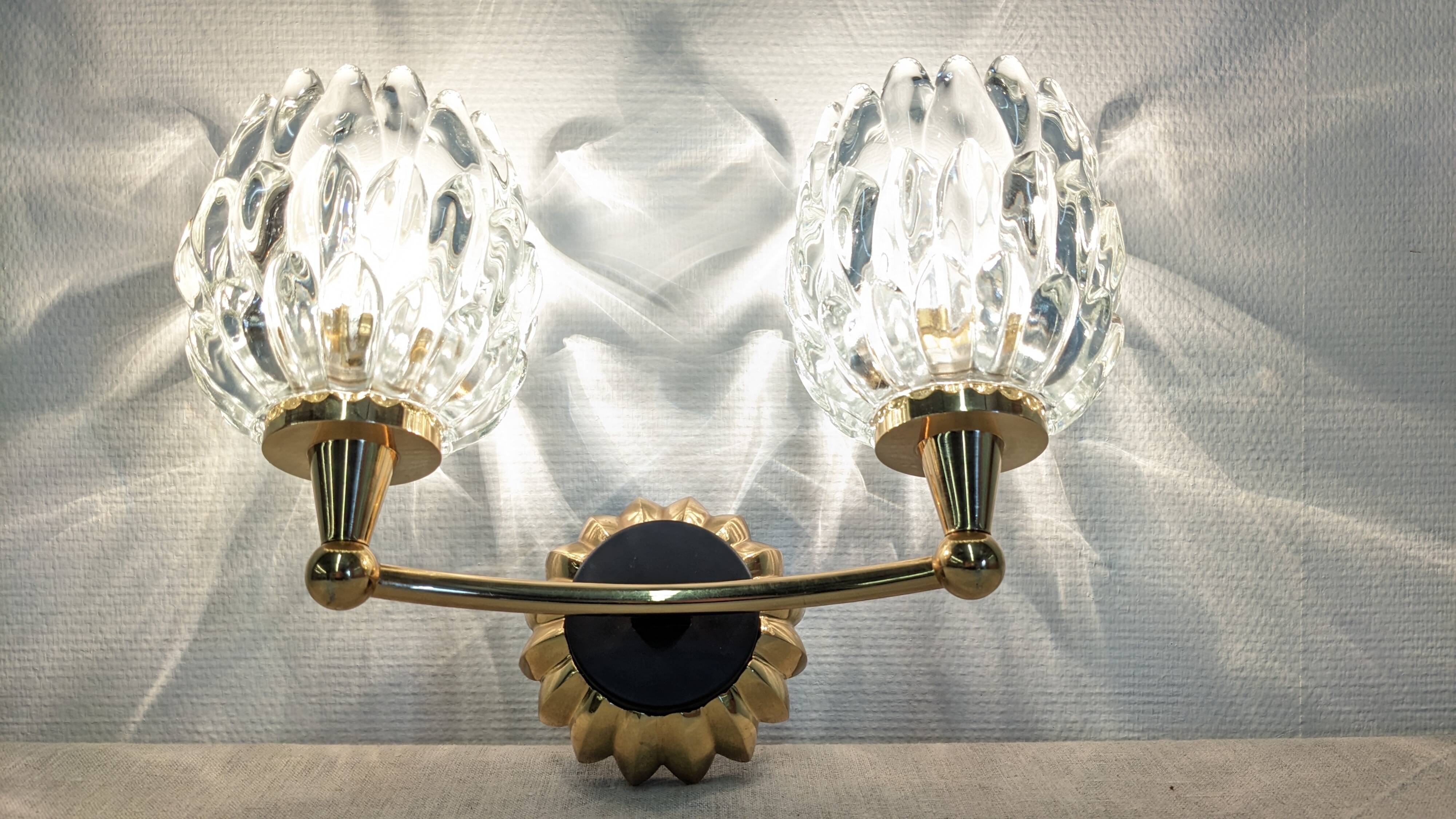 Set of 4 modernist double wall lights by Maison Arlus, France circa 1950.