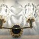 Set of 4 modernist double wall lights by Maison Arlus, France circa 1950.