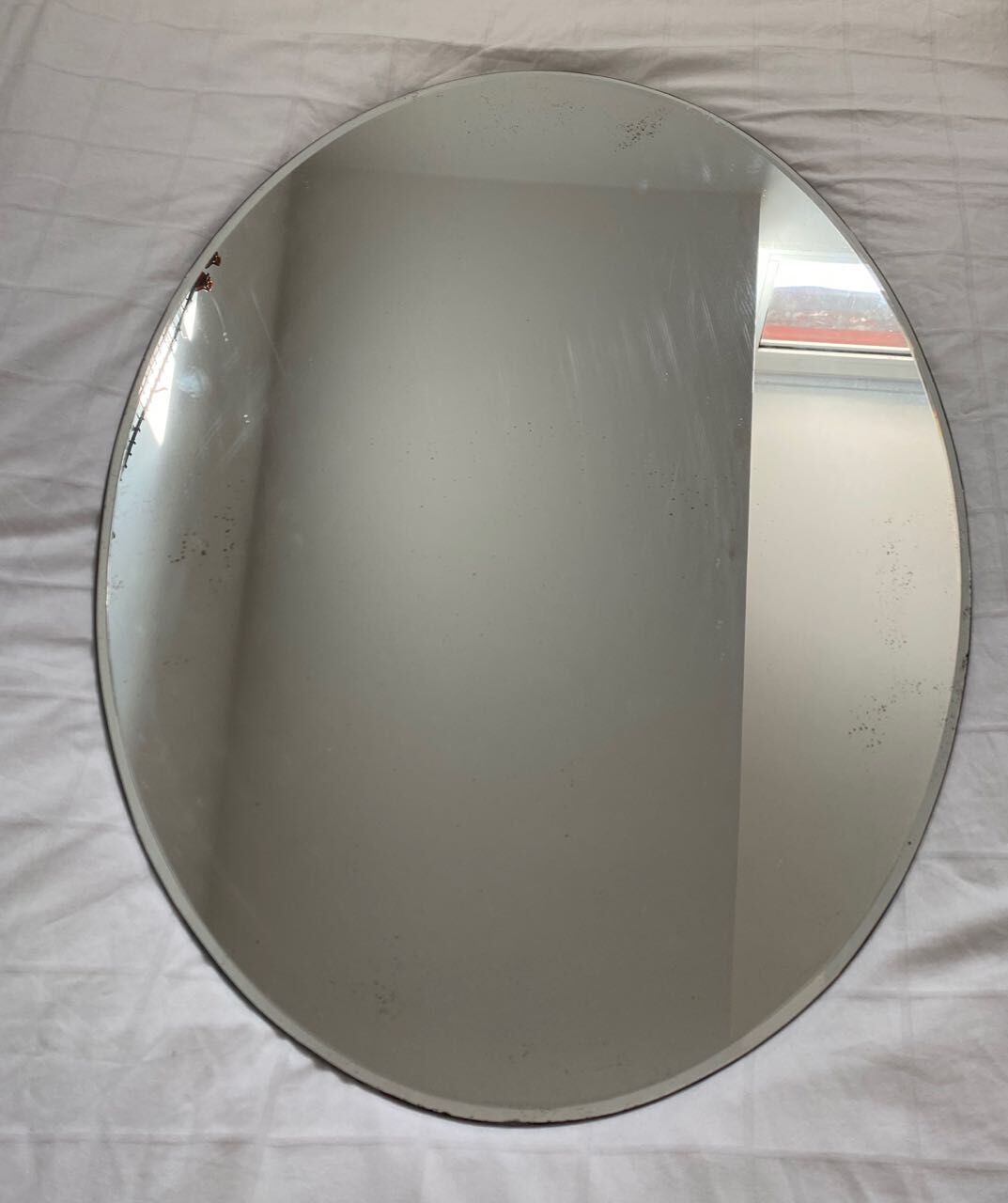 Oval bevelled mirror - 72x51cm