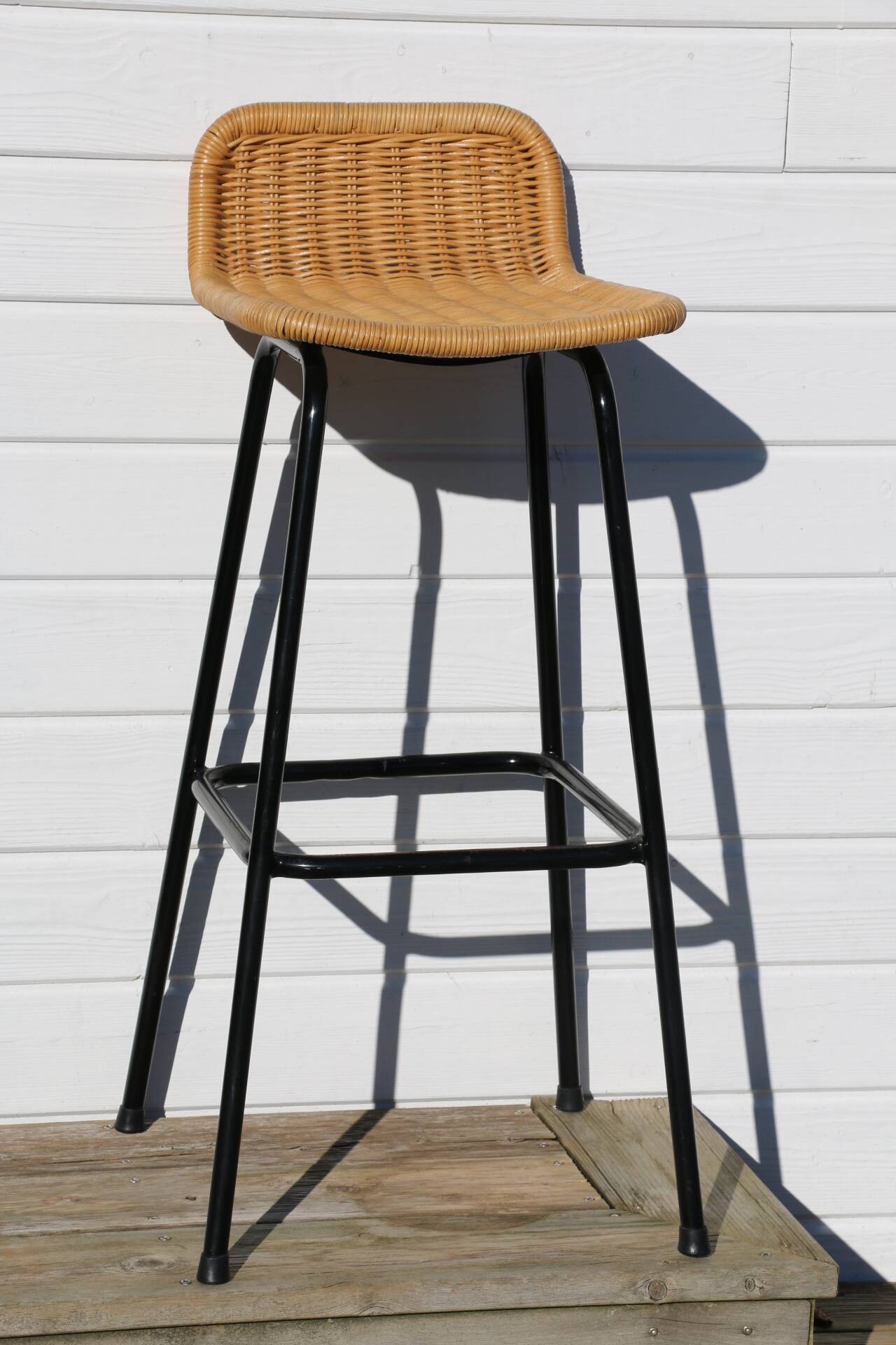 3 rattan and black metal stools dirk van sliedregt