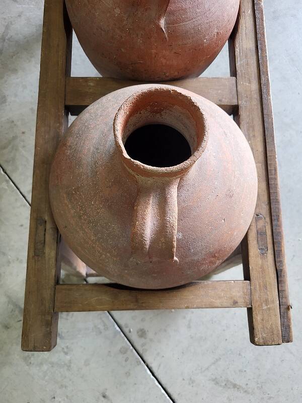 Old wooden jar holder with 3 clay jars