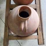 Old wooden jar holder with 3 clay jars