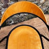 Pair of wooden and black metal chairs