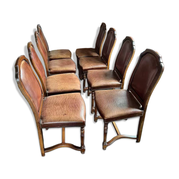 Un lot de 8 chaises  en Chêne fond en cuir Brun (paid 5.354 euros en 1999)