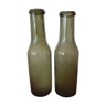 Paire de bouteilles vertes en verre soufflé bullé