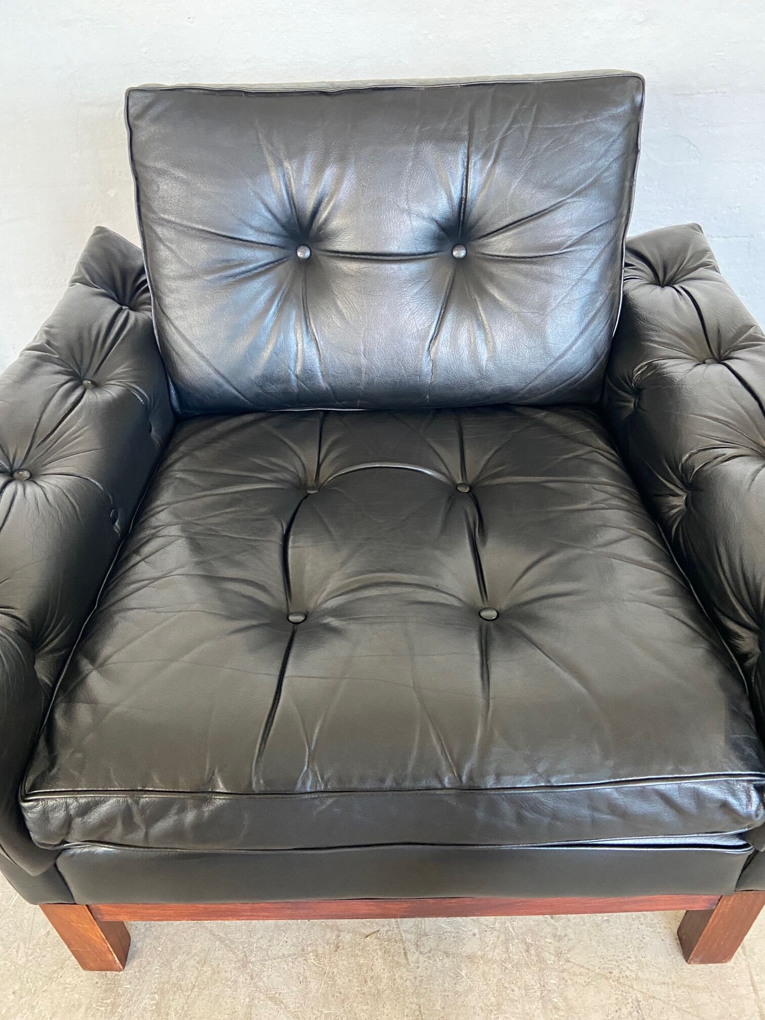 Vintage Danish mid-century black leather armchair – 1970s