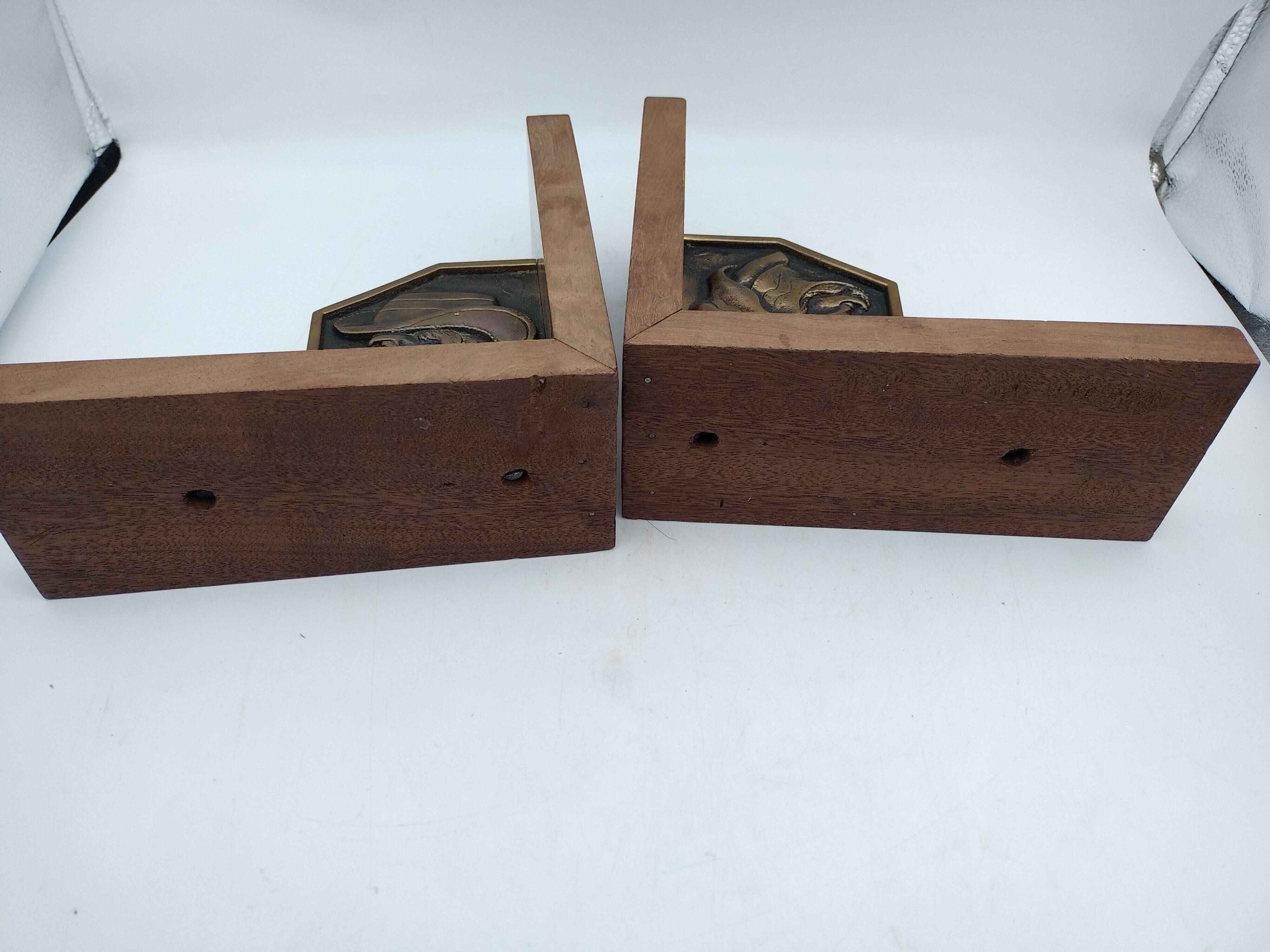 Pair of Breton couple bookends in bronze and wood.