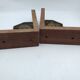 Pair of Breton couple bookends in bronze and wood.