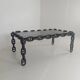 Vintage brutalist black iron chain link coffee table with original smoked glass, 70s