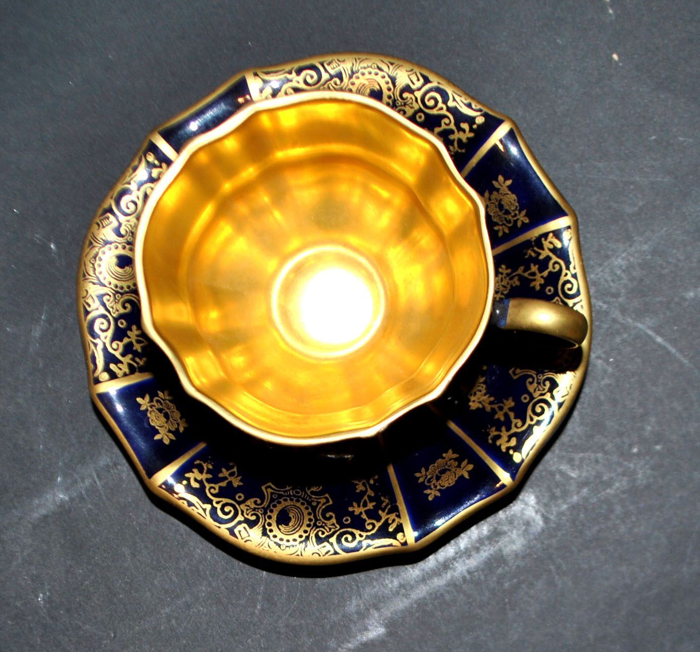 A precious, multi-lobed cup in German cobalt porcelain with a gold interior, Lindner Bavaria.