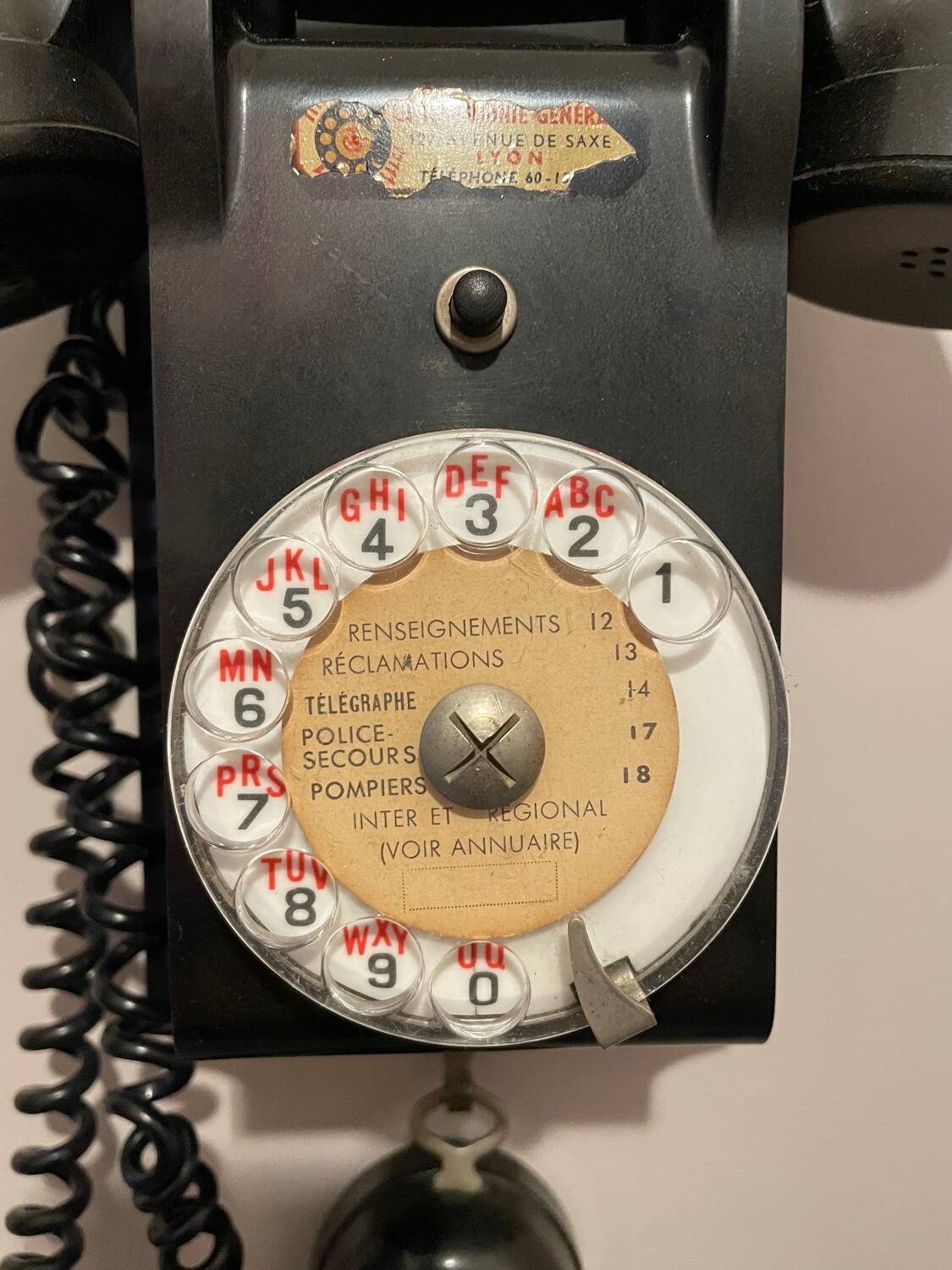 Old Ericsson wall telephone in black bakelite