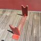 Banc ancien en bois peint en rouge
