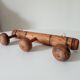 Antique folk art wall coat rack from the 50s