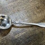 Small silver metal ladle from the Christofle brand, shell model