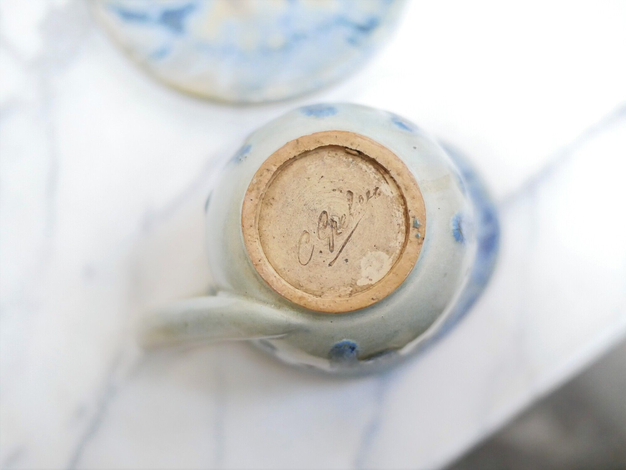 Series of 3 cups, a milk jar and 4 antique porcelain saucers