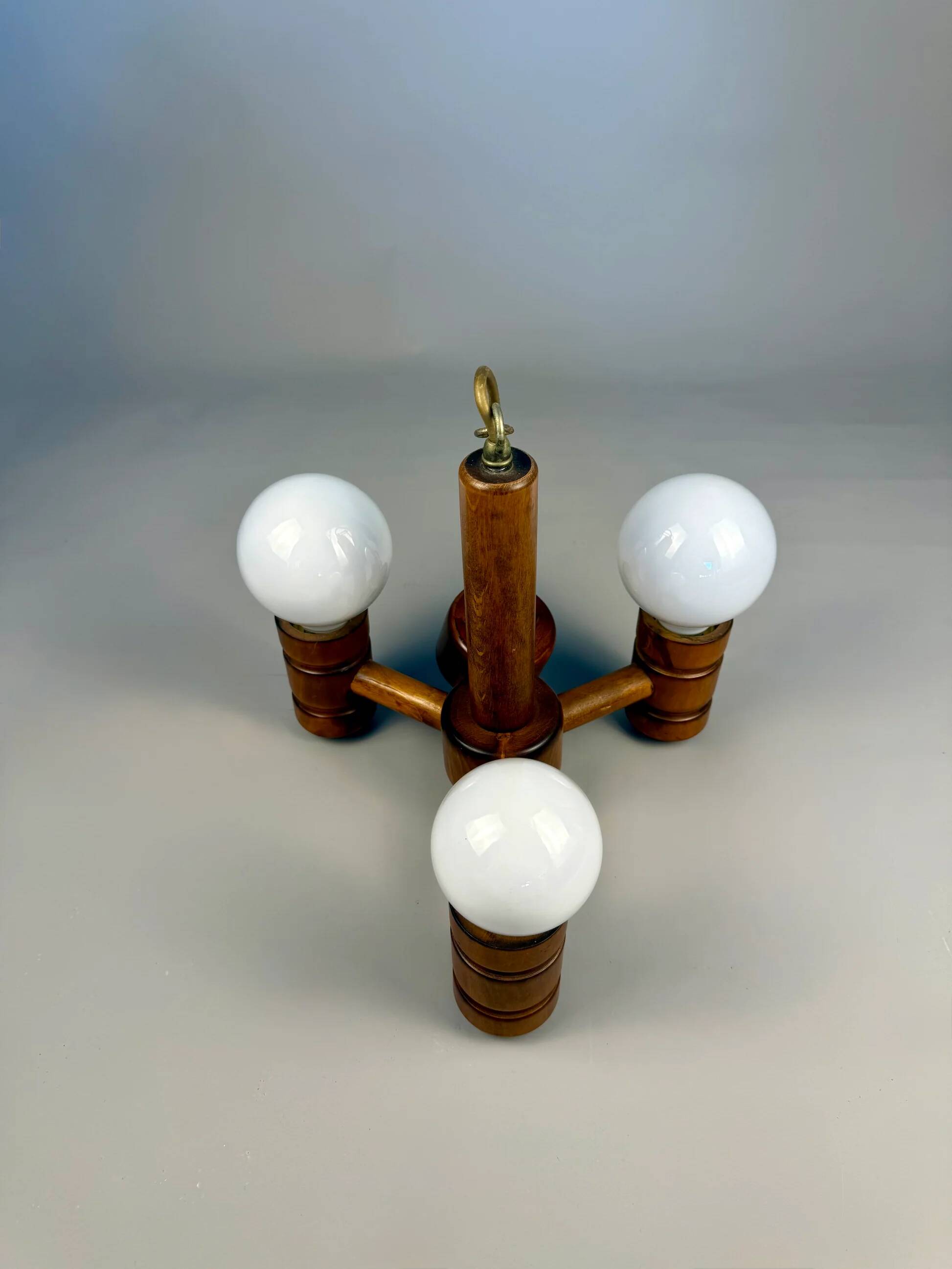 Vintage wooden chandelier with three lights