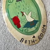 Old enameled plaque “Bathroom”