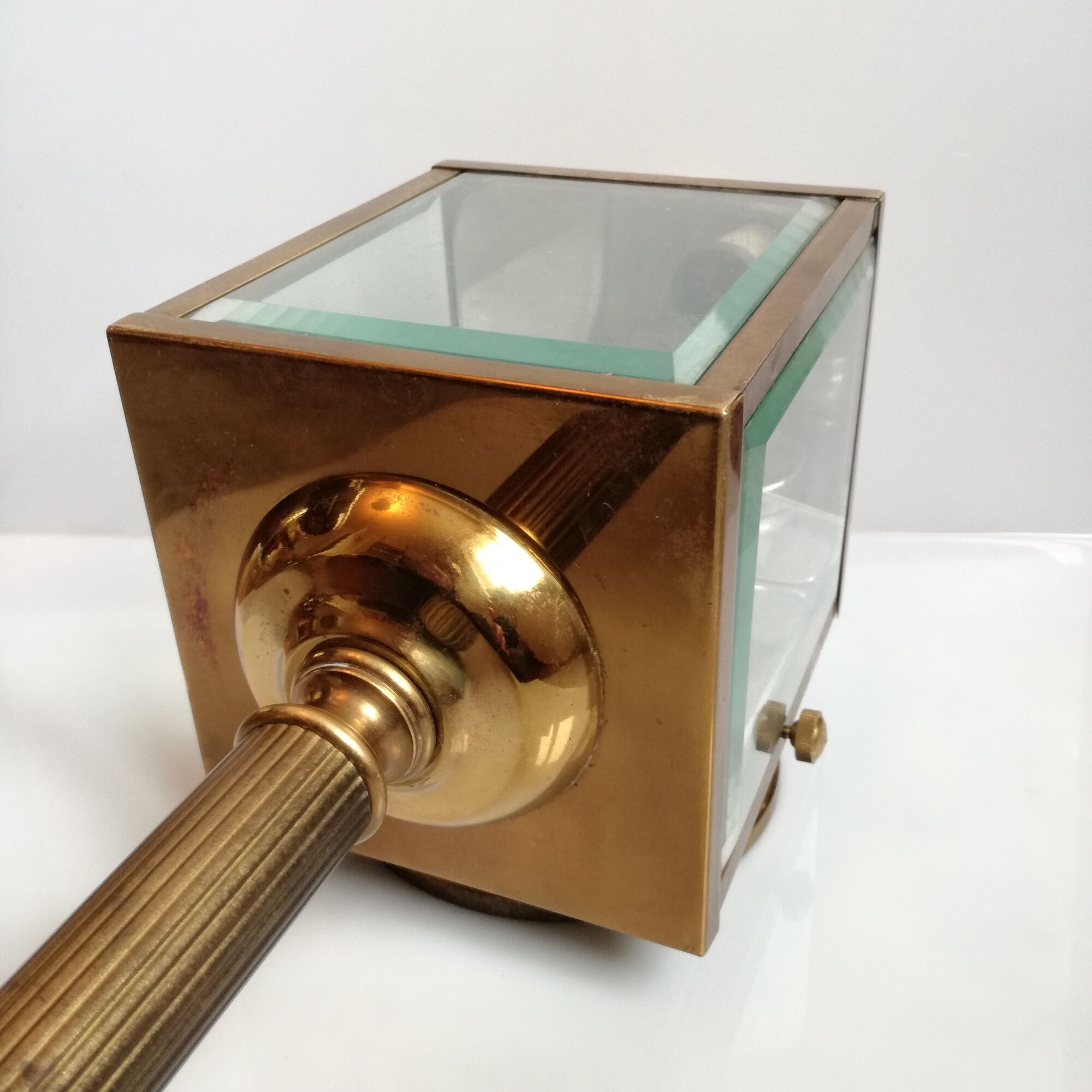 Brass and beveled glass lantern-like wall lamps in brass and beveled glass