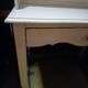 White lacquered desk.