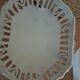 Malicorne fruit bowl in white pierced faience with monogram TE.