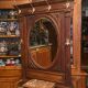 Porte-manteau de vestibule en noyer massif avec miroir ovale et patères en bronze
