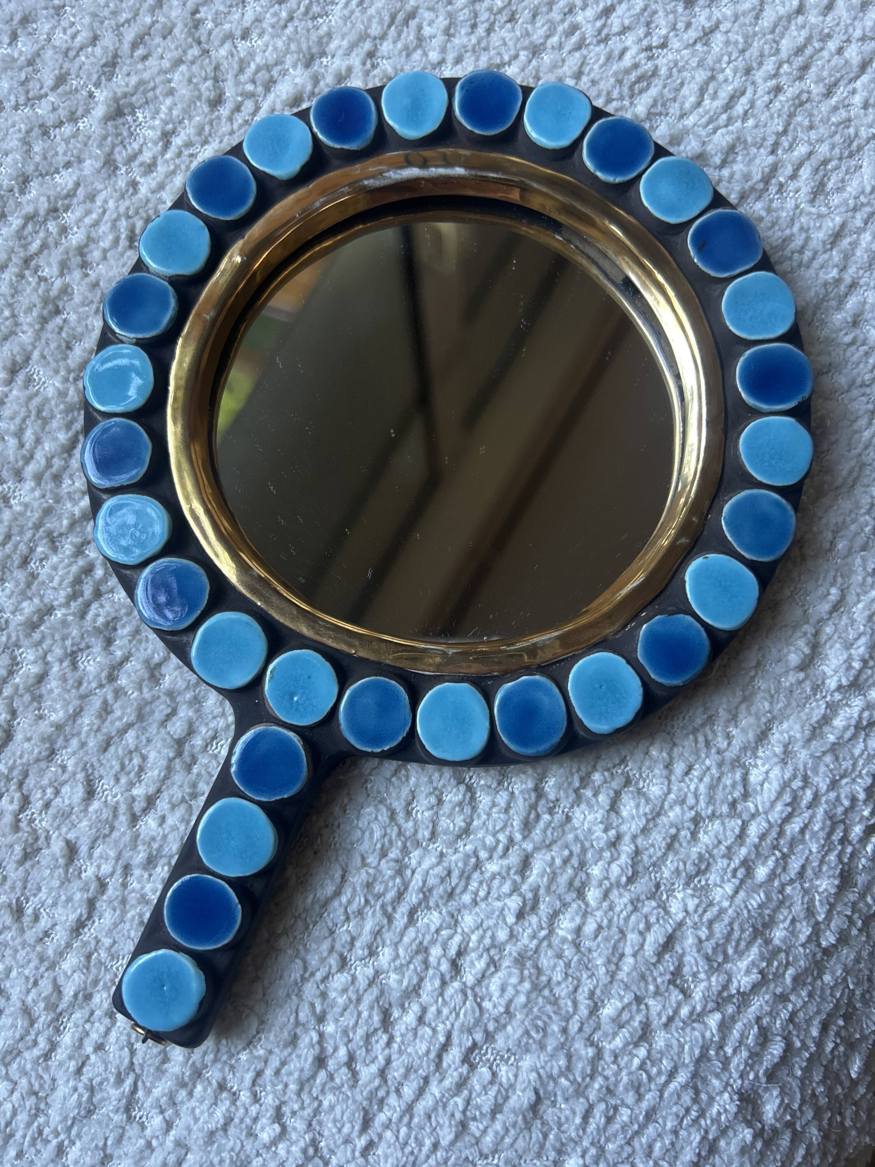 Mithé Espelt handheld mirror