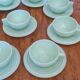 Lot de 9 tasses et soucoupes en opaline
