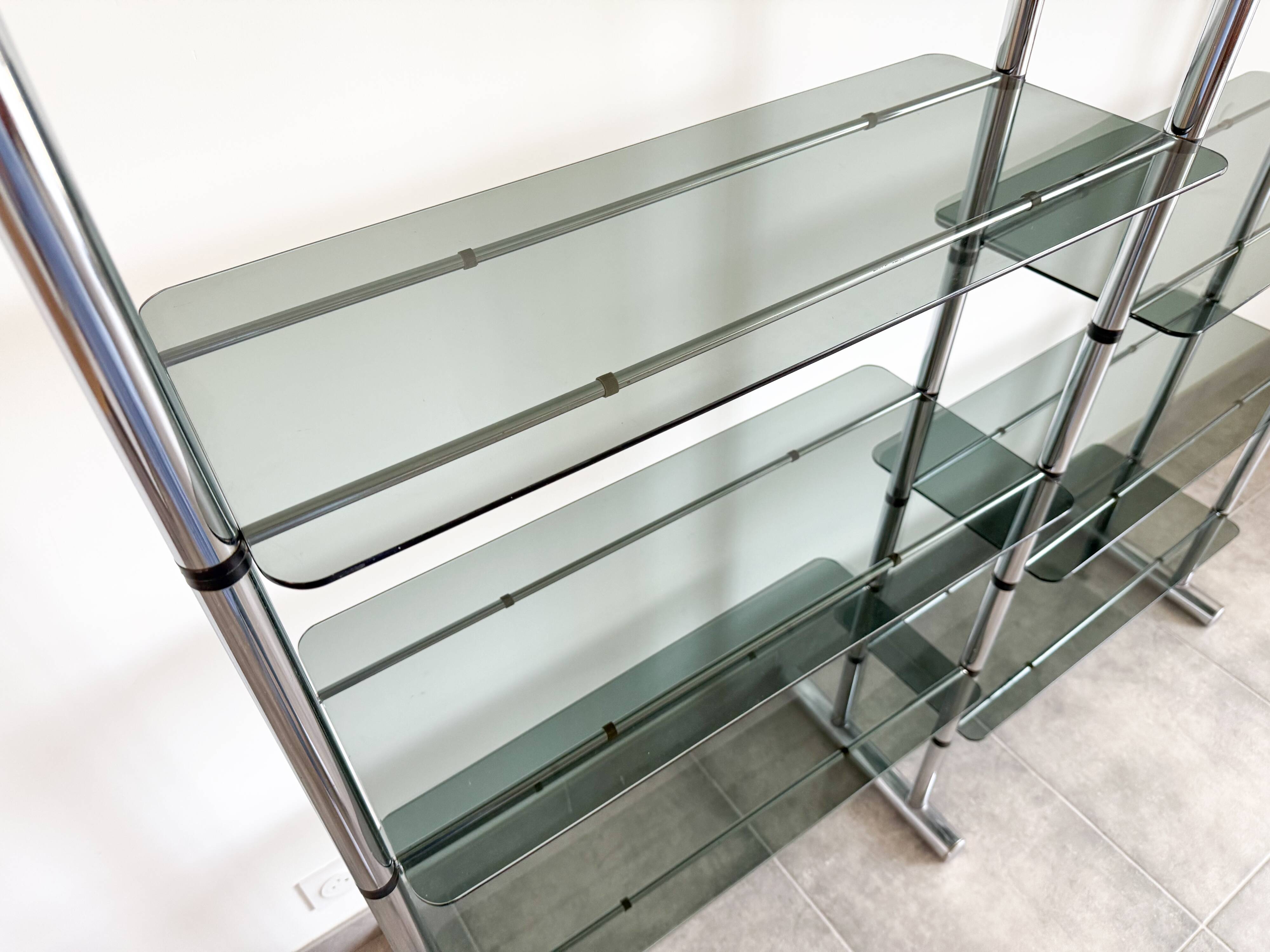 Double chrome and glass bookshelf from the 1970s.