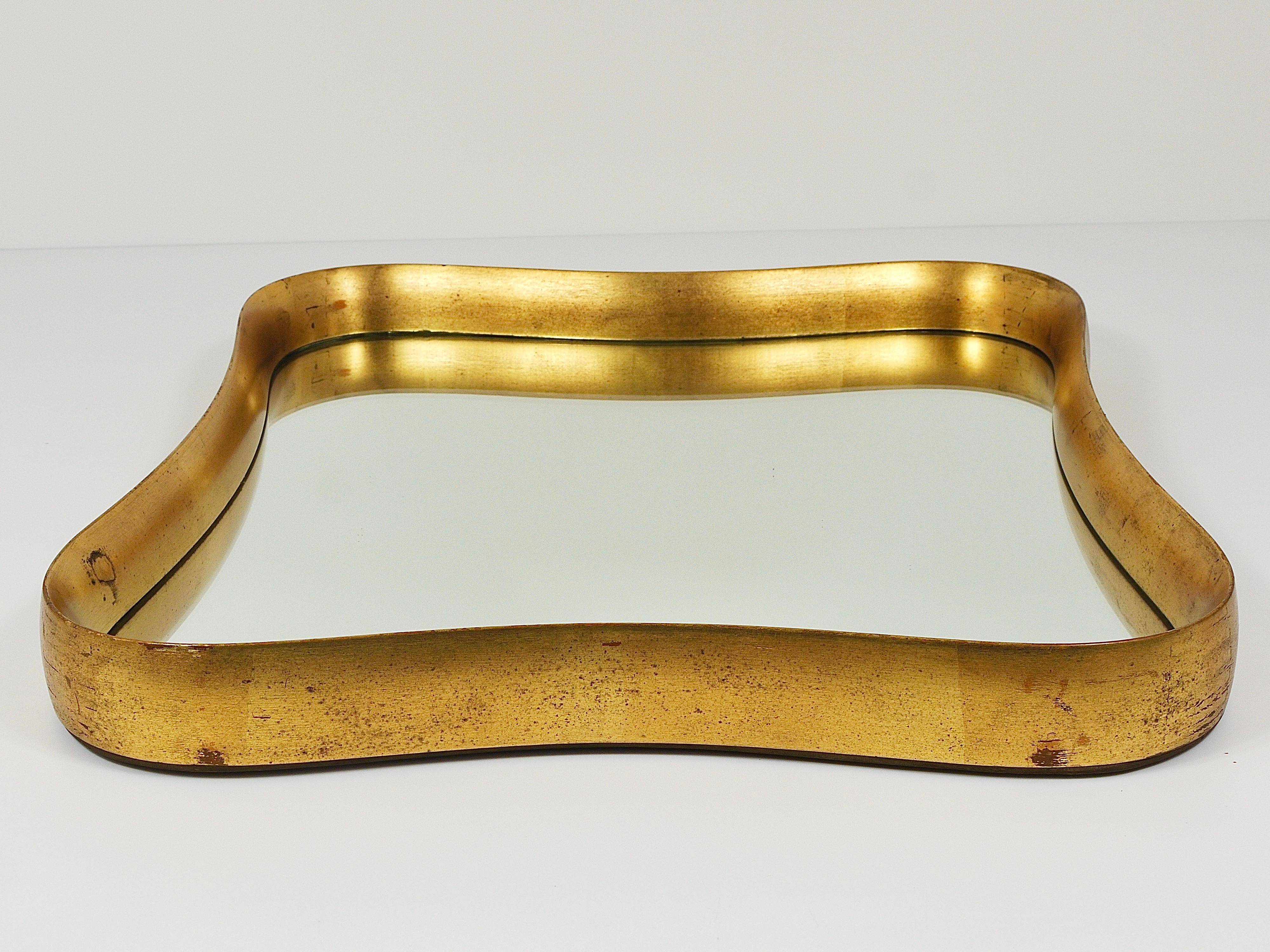 Golden wooden mirror in the style of Gio Ponti by Max Welz, Vienna, Austria, 1940s.