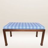 Ottoman coffee table in wood and gingham fabric.