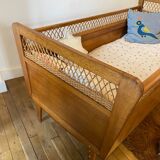 Wooden and wicker baby bed