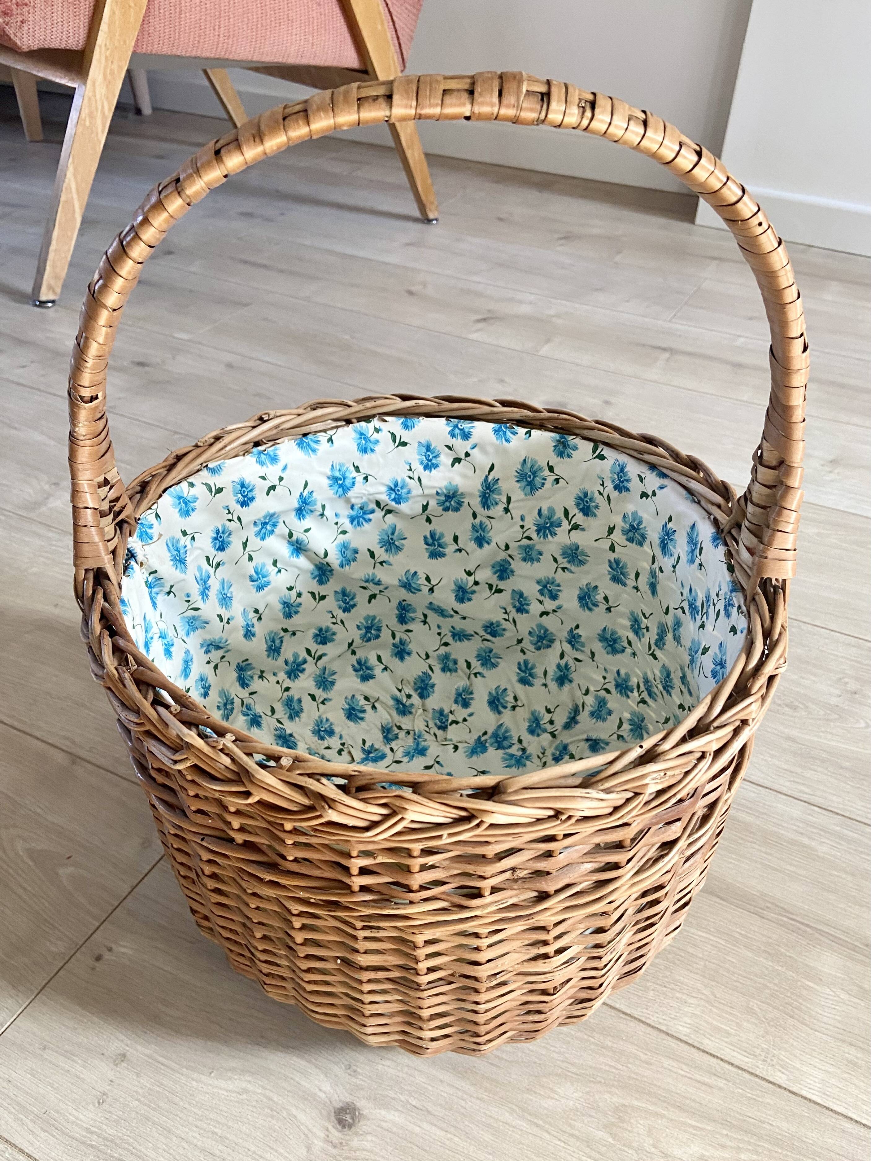 Wicker basket with waxed canvas blue flowers