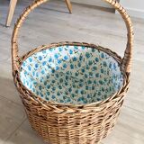 Wicker basket with waxed canvas blue flowers