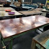 Table made of wood and foldable metal