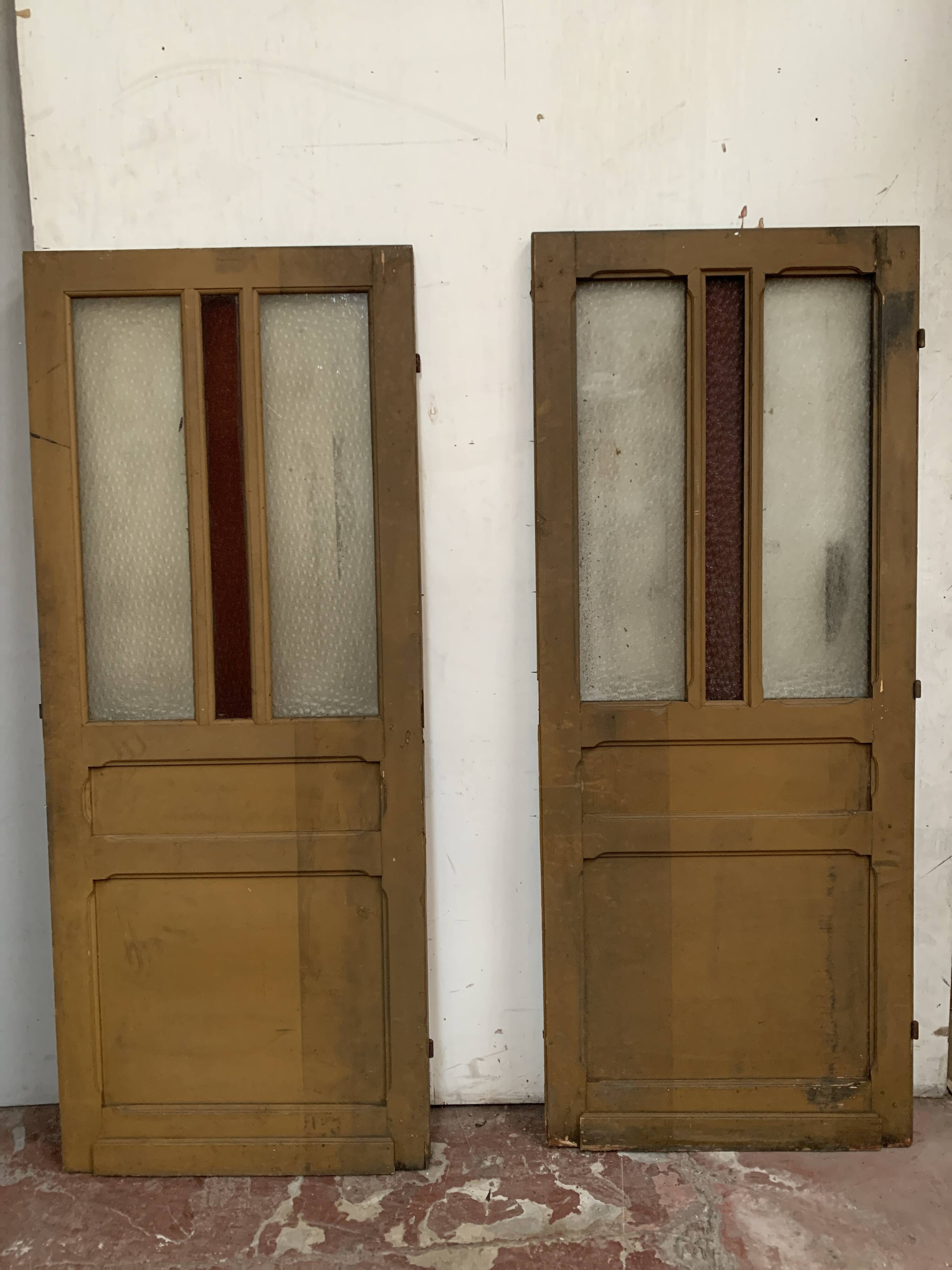Double glass and patinated fir passage doors, 20th century