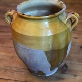 Old yellow pot varnished with confit from the Southwest