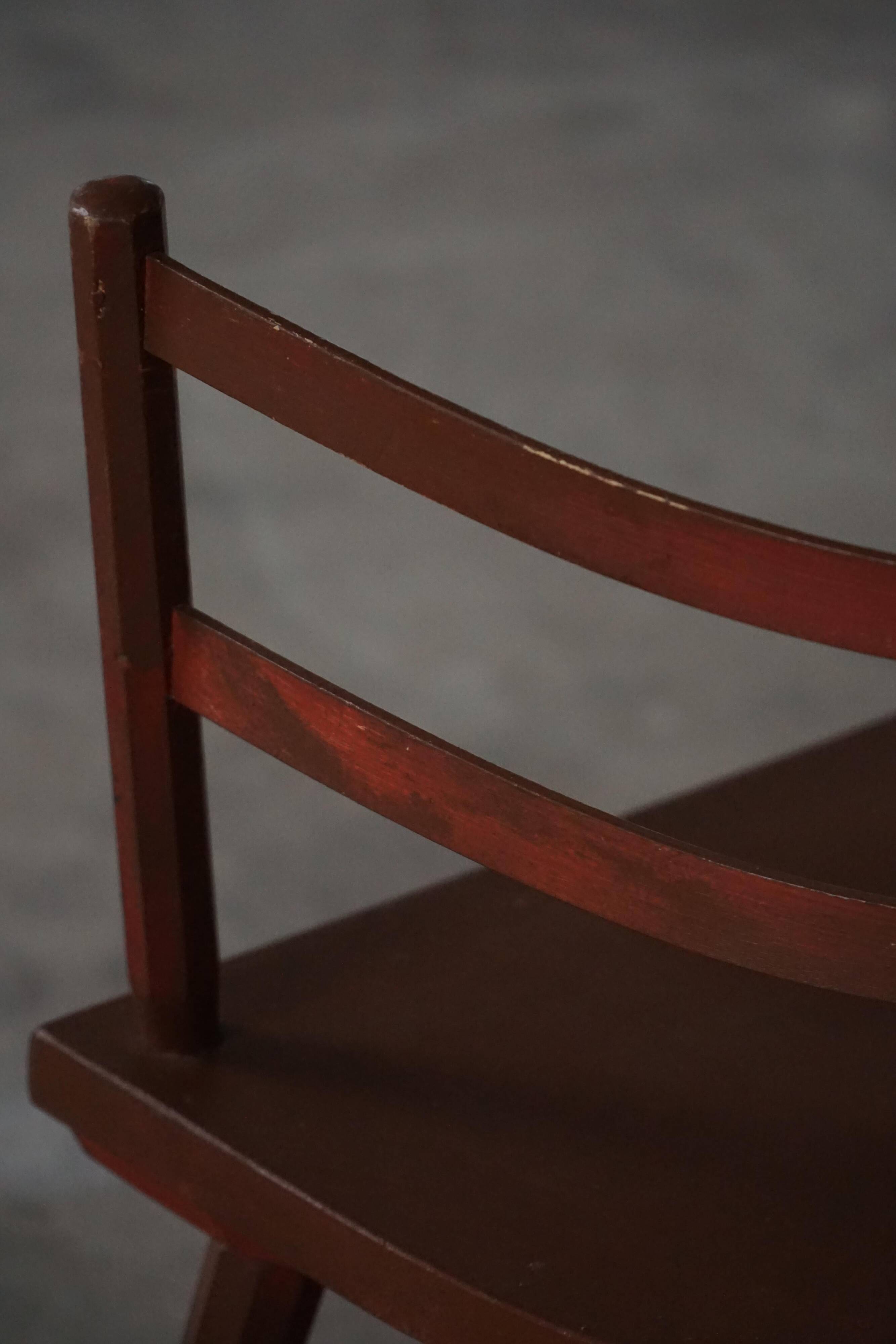 Pair of Scandinavian wooden armchairs with hand-carved folk motifs, 1920s.