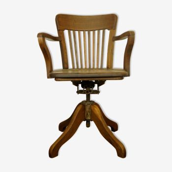 Fauteuil américain chêne massif, pivotant 360°, basculant & réglable en hauteur. vers 1920