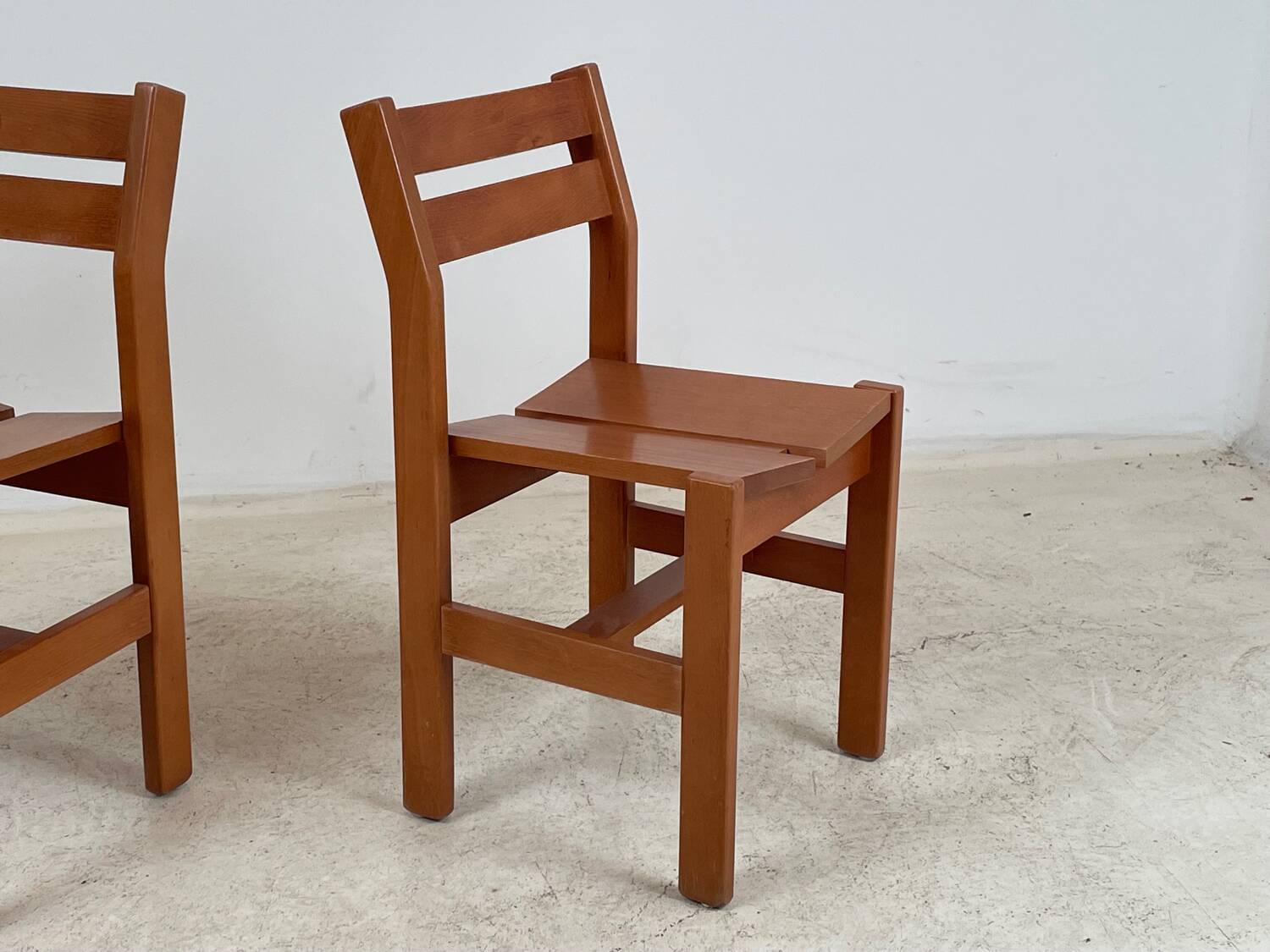 2 Regain chairs for the 1970s arcs.