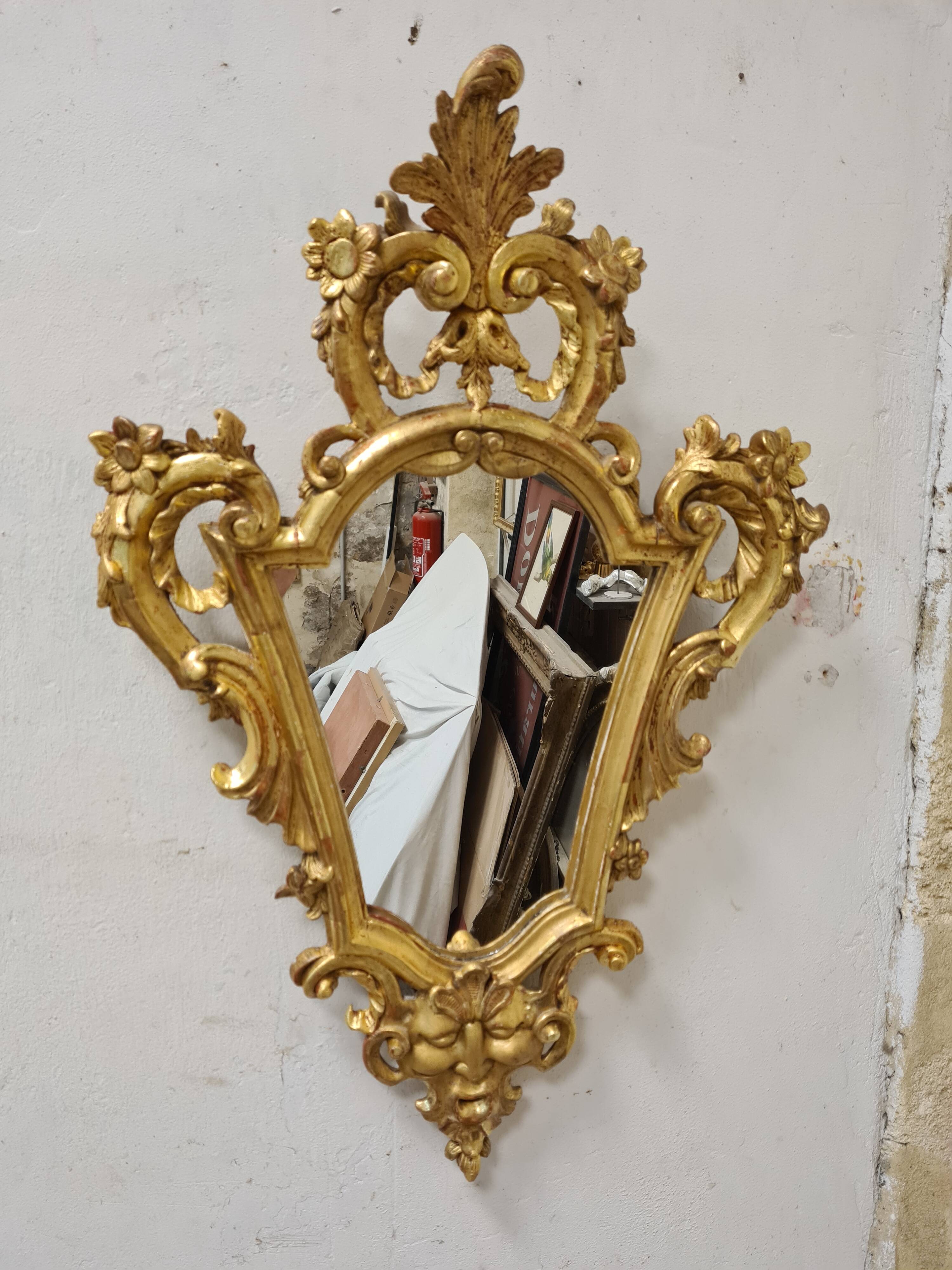 Antique baroque gilded mirror in carved wood, 18th century