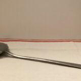 Old large sauce spoon with spout
