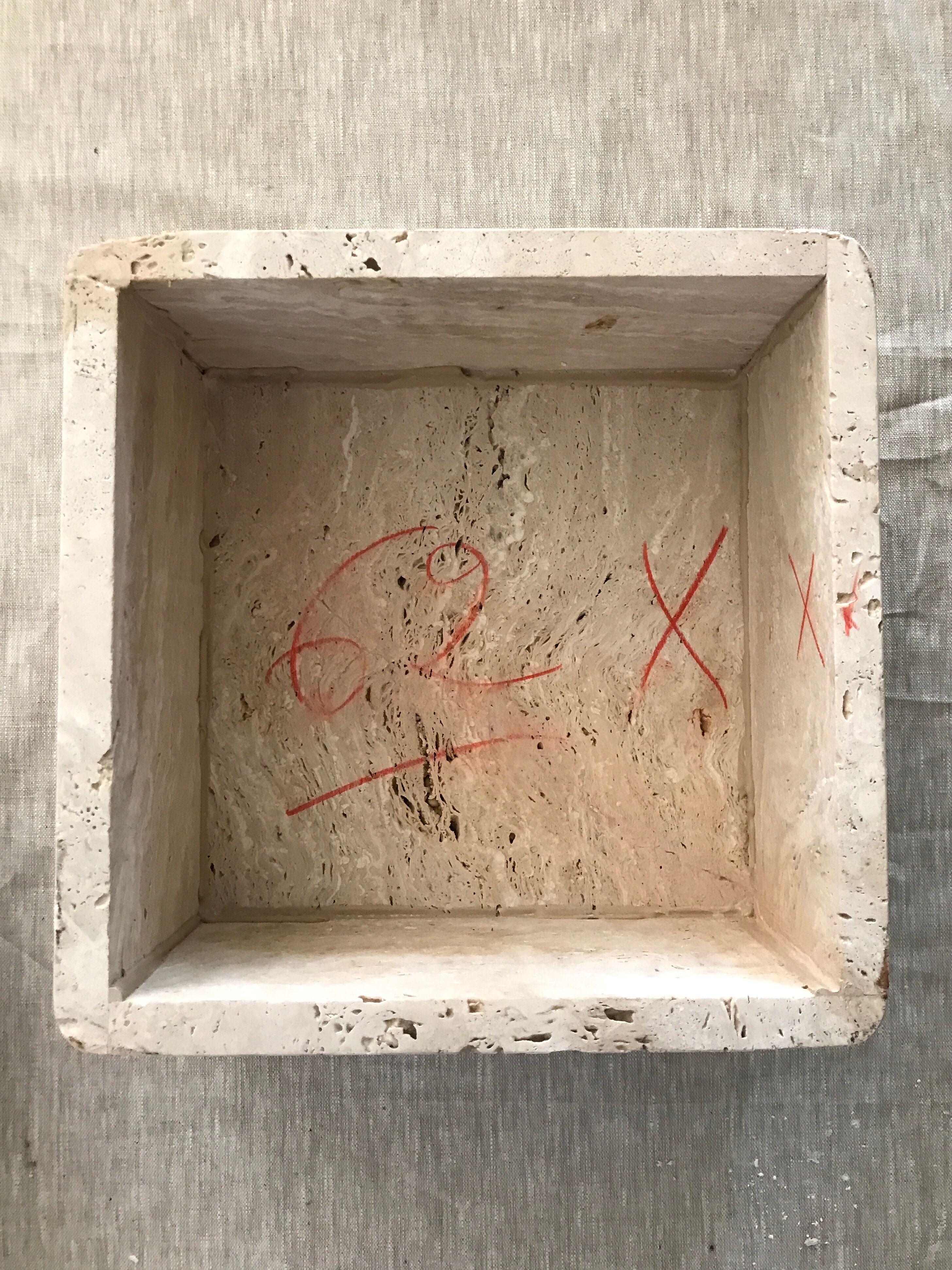 Sculptural travertine coffee table