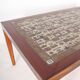 Set of coffee tables in rosewood and ceramic.