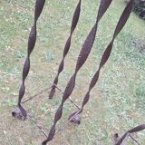 Pair of Brutalist patinated iron and veined marble columns, 1960s