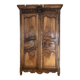 Antique walnut armoire with two doors.