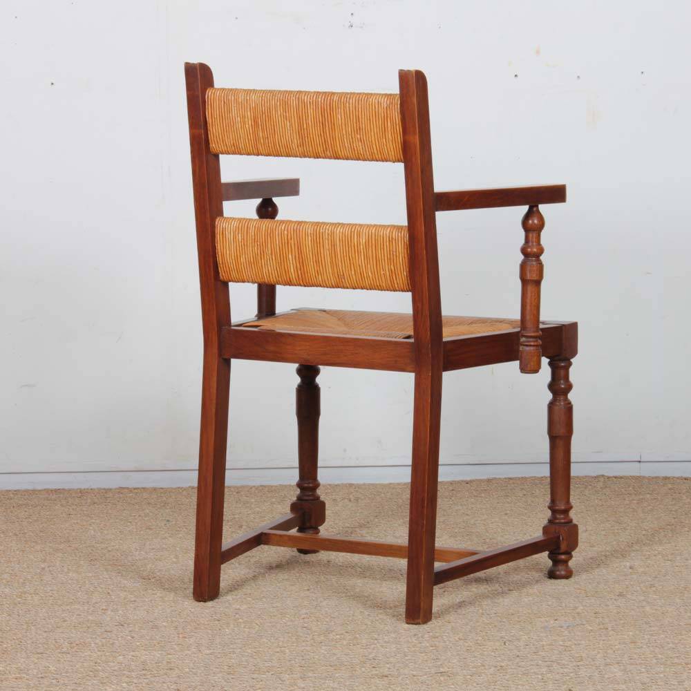 Pair of oak straw-seated armchairs from the 1950s.