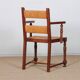Pair of oak straw-seated armchairs from the 1950s.