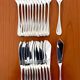Christofle Marot Berain, 12 fish cutlery sets, shell decor