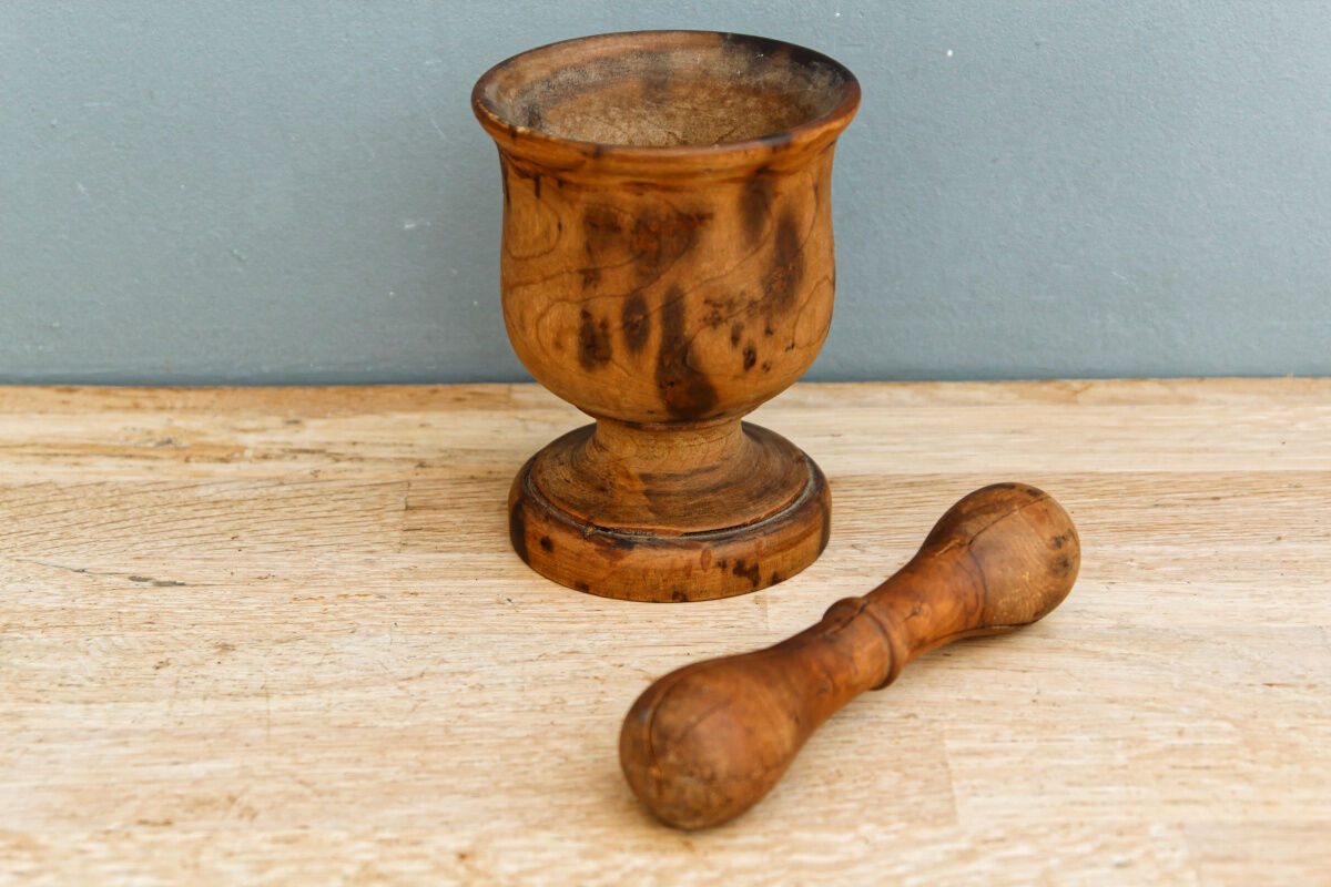 Ancient mortar and pestle, solid wood