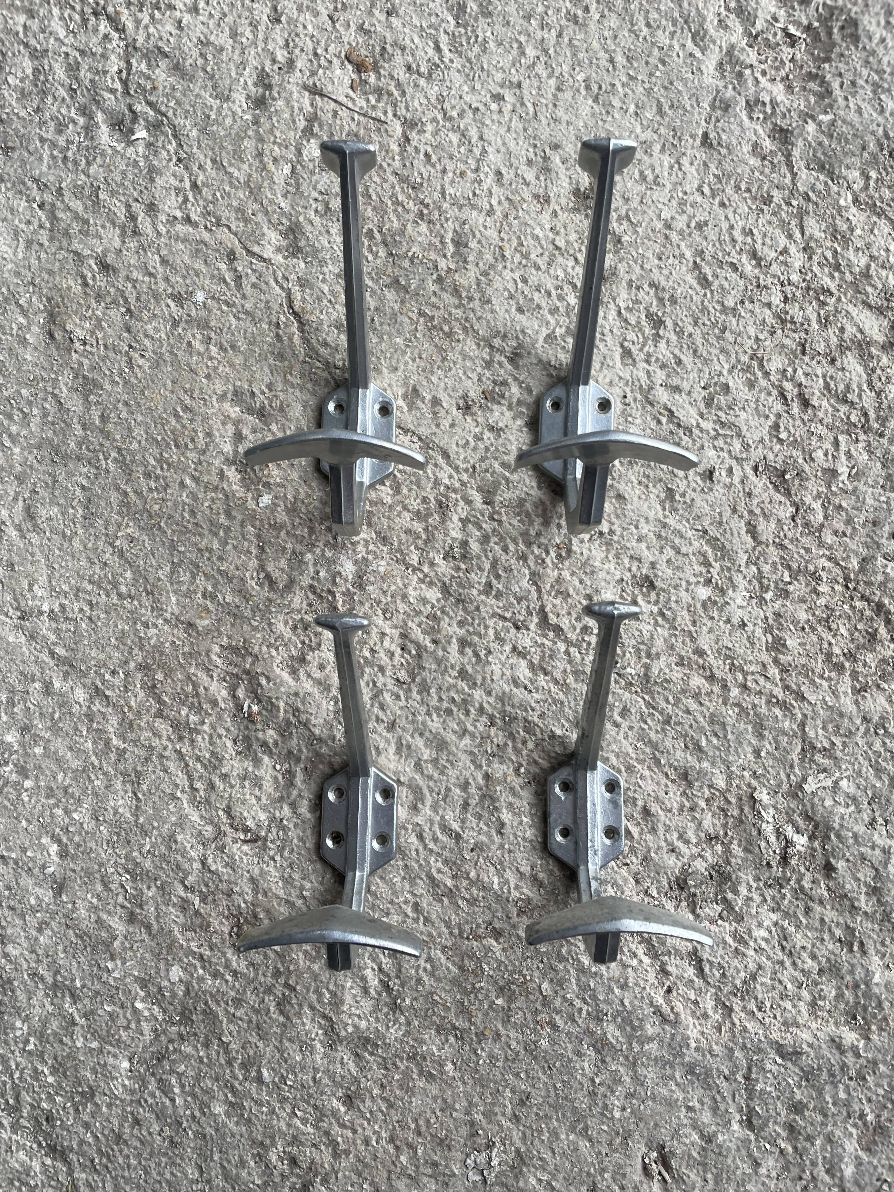 Set of 4 old metal coat hooks